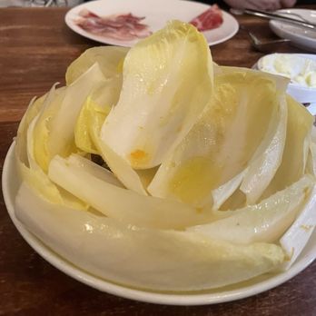 Estela - Endive with walnuts, anchovy, and ubriaco rosso - New American Near Me - New York, New York Estela - Endive with walnuts, anchovy, and ubriaco rosso - New American Near Me - New York, New York