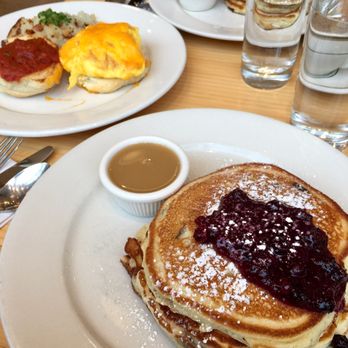 Clinton St. Baking - Pancakes with blueberries and biscuit with eggs, cheese, tomato jam and home fries - Bakeries Near Me - New York, New York Clinton St. Baking - Pancakes with blueberries and biscuit with eggs, cheese, tomato jam and home fries - Bakeries Near Me - New York, New York