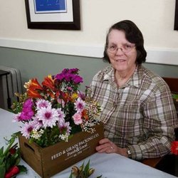 Peninsula Reflections - Flowers bring smiles to everyone. Flowers arrangement group every week.