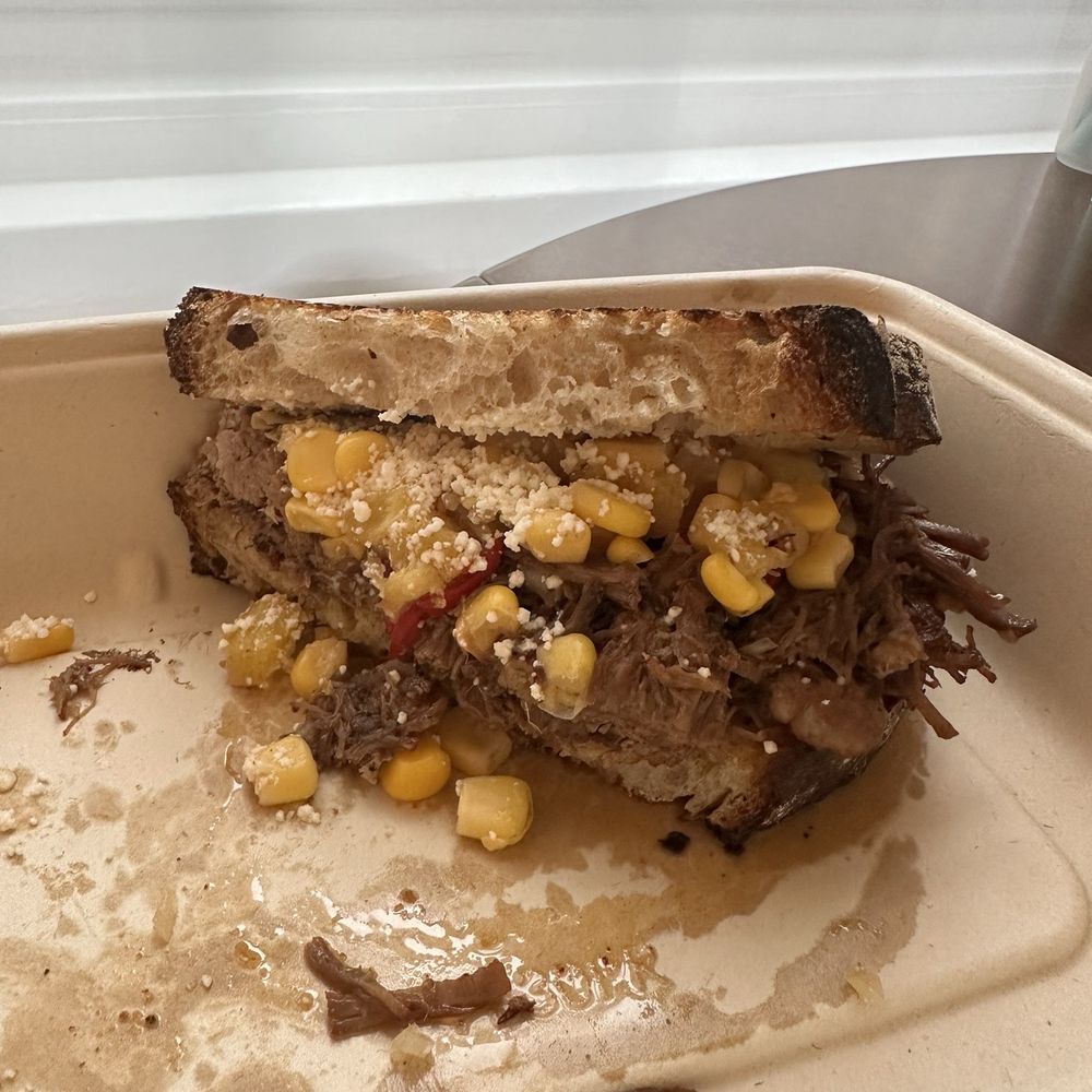 Regular NYC - The Brisket (comes with TWO halves, had eaten the first half already) - Breakfast & Brunch Near Me - New York, New York Regular NYC - The Brisket (comes with TWO halves, had eaten the first half already) - Breakfast & Brunch Near Me - New York, New York