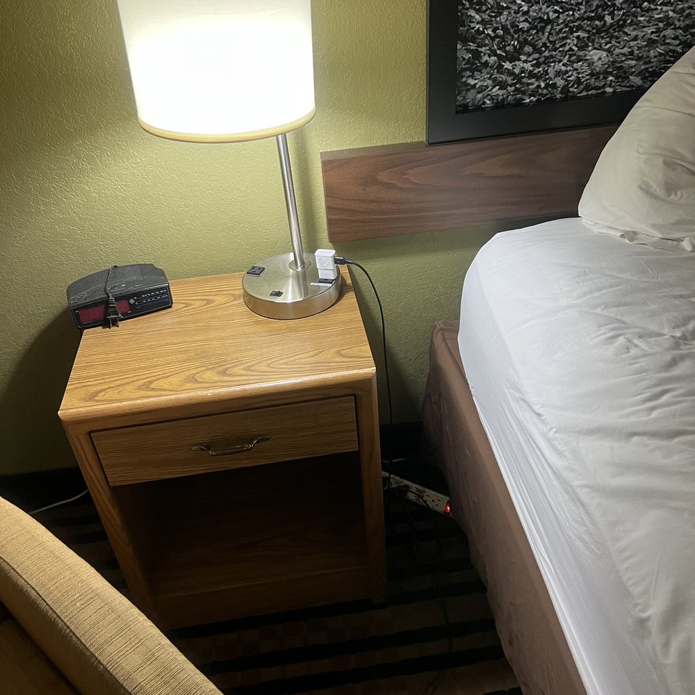 Super 8 by Wyndham Windsor/Madison North - Gross surge protector that is poorly hidden and had never been cleaned. - Hotels Near Me - Windsor, Wisconsin