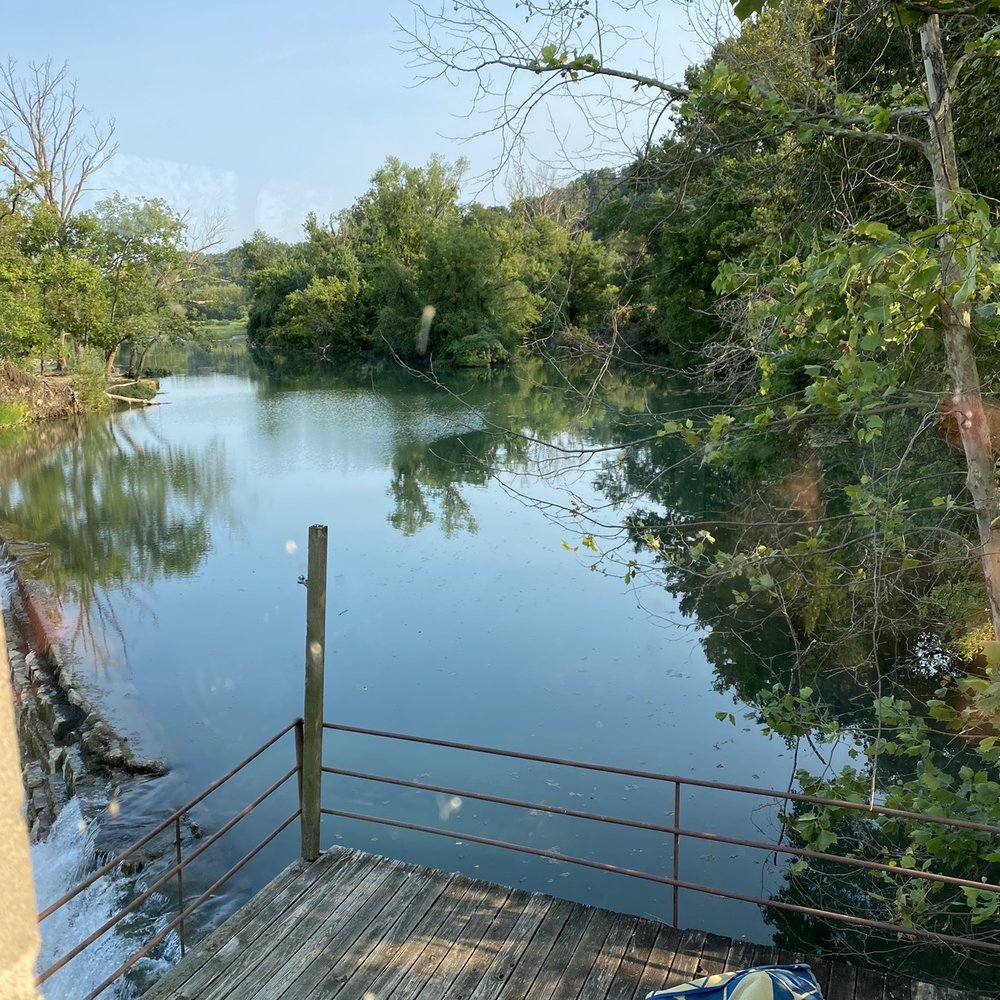Haven 55 - Outdoor patio overlooking the river. - American Near Me - Pineville, Missouri