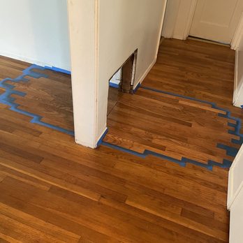 Hana Hardwood - Area of repair in blue includes feathering of hardwood and matching stain and finish. - Flooring Near Me - Redondo Beach, California Hana Hardwood - Area of repair in blue includes feathering of hardwood and matching stain and finish. - Flooring Near Me - Redondo Beach, California