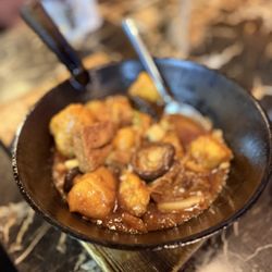 Halibut and tofu in iron pot