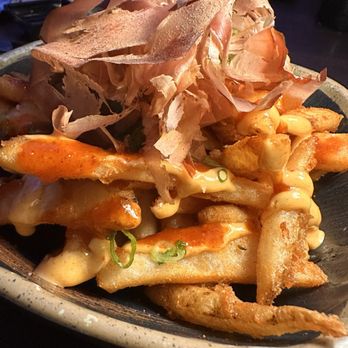 Thrive - Fire Fries- This was ok. I think I would like the sauce on the side though. - Cocktail Bars Near Me - Orlando, Florida Thrive - Fire Fries- This was ok. I think I would like the sauce on the side though. - Cocktail Bars Near Me - Orlando, Florida