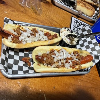 Hank's Filling Station - two hot dogs on buns - Bars Near Me - Norfolk, Virginia