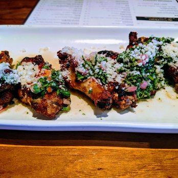 Doc B's Restaurant + Bar - Oven roasted chicken wings. - New American Near Me - Austin, Texas Doc B's Restaurant + Bar - Oven roasted chicken wings. - New American Near Me - Austin, Texas