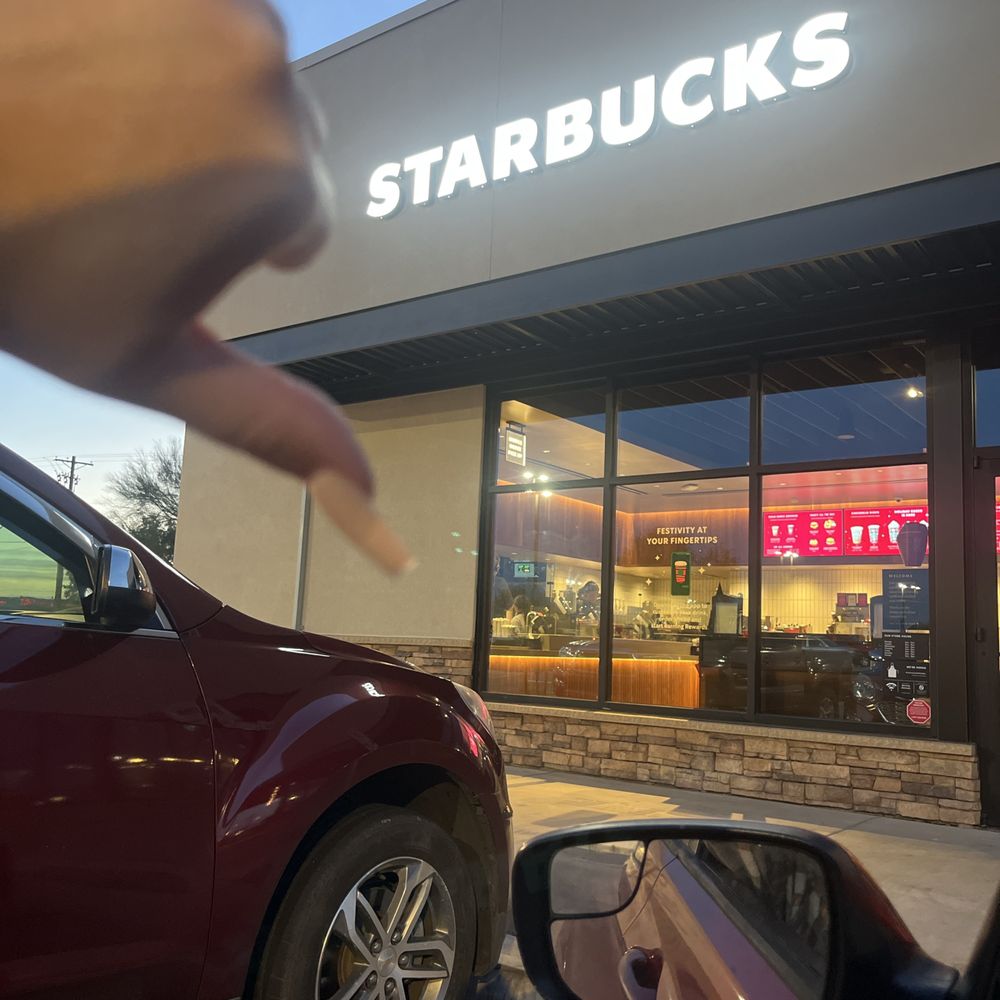 Starbucks - a hand pointing at a starbucks sign - Coffee & Tea Near Me - Tucson, Arizona Starbucks - a hand pointing at a starbucks sign - Coffee & Tea Near Me - Tucson, Arizona