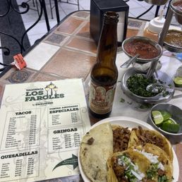 Gringa de carne asada y tacos al pastor. Gringa with steak and tacos al pastor (pork). Gringa de carne asada y tacos al pastor. Gringa with steak and tacos al pastor (pork).