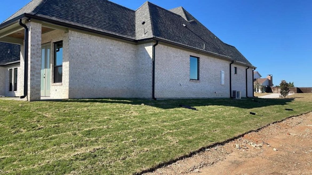 Slide of Triple GGG's Seamless Gutters