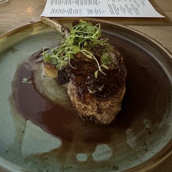 Crasqui - Pork chops with potatoes cooked into scallop shapes. - Venezuelan Near Me - Saint Paul, Minnesota