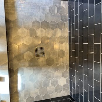 JRT Remodeling - a shower in a bathroom - General Contractors Near Me