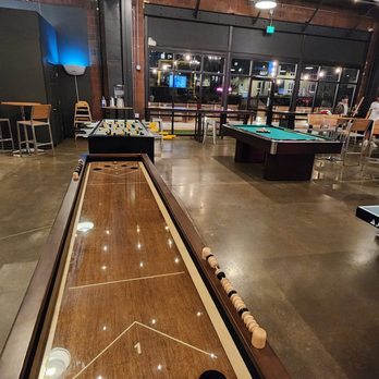 Pindustry - Game area with foosball, pool tables, ping pong and pong - Cocktail Bars Near Me - Greenwood Village, Colorado Pindustry - Game area with foosball, pool tables, ping pong and pong - Cocktail Bars Near Me - Greenwood Village, Colorado