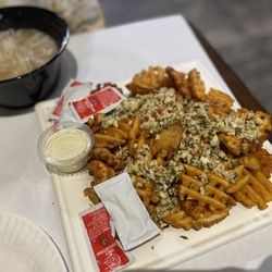 Crawfish Noodle & Grill - Custom ordered waffle fries with garlic = $11