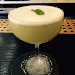 A peach champagne cocktail with mint and vodka, as good as it gets.
