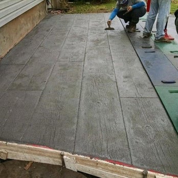 Curb 'n Decor - wo people working on a patio - General Contractors Near Me - Suamico, Wisconsin Curb 'n Decor - wo people working on a patio - General Contractors Near Me - Suamico, Wisconsin