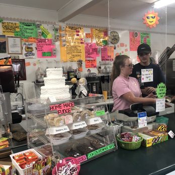 Smiles Sundaes - a man and a woman behind a counter - Ice Cream & Frozen Yogurt Near Me - Sandusky, New York
