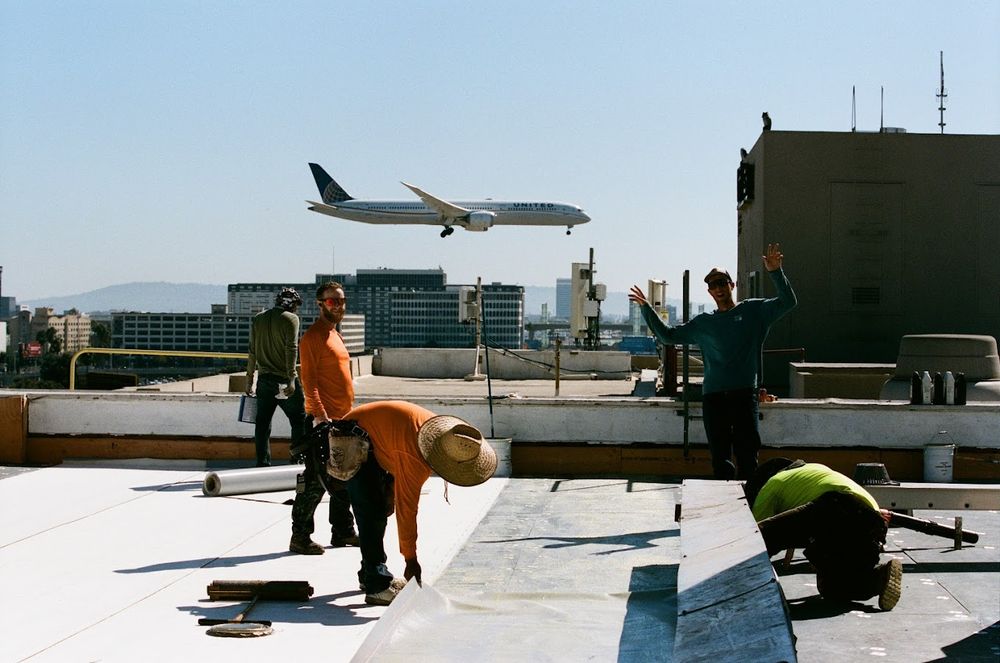 Slide of Swell Roofing