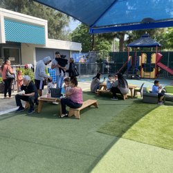 Pacoima Early Education Center - We love inviting our families to all events. Here, families are enjoying some time together on the yard.