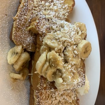Kihei Caffe Lahaina - MacNut Banana Pancakes (they have coconut syrup and reg on the table) - Breakfast & Brunch Near Me - Lahaina, Hawaii Kihei Caffe Lahaina - MacNut Banana Pancakes (they have coconut syrup and reg on the table) - Breakfast & Brunch Near Me - Lahaina, Hawaii