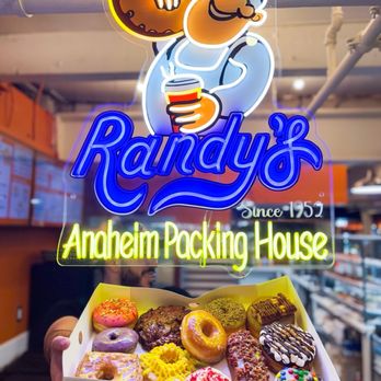 Randy's Donuts - Dozen donuts!! I just came for one and had to get a whole box to share with the fam bam - Donuts Near Me - Anaheim, California Randy's Donuts - Dozen donuts!! I just came for one and had to get a whole box to share with the fam bam - Donuts Near Me - Anaheim, California