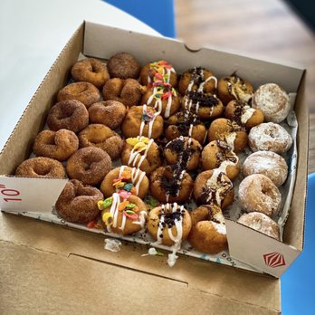Sugar Llamas - Variety box filled with cinnamon sugar, fruity pebbles, s'mores, cookie crumbles, and powdered sugar - Donuts Near Me - Tulsa, Oklahoma