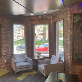 Restoration Cafe - The interior window nook where you can sit and enjoy a drink or bakery item. - Cafes Near Me - Manchester, New Hampshire