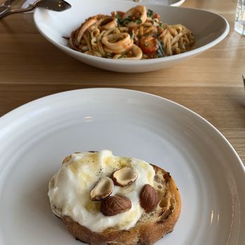 Delarosa Bishop Ranch - Burrata, hazelnut and honey toast with the lunguini in the background. - Pizza Near Me - San Ramon, California Delarosa Bishop Ranch - Burrata, hazelnut and honey toast with the lunguini in the background. - Pizza Near Me - San Ramon, California