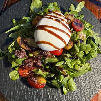 Ross' Grill - Arugula salad with burrata cherry tomatoes and black olive tapenade (Special) - American Near Me - Provincetown, Massachusetts