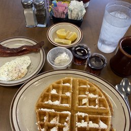 Waffle with egg and bacon. Waffle with egg and bacon.