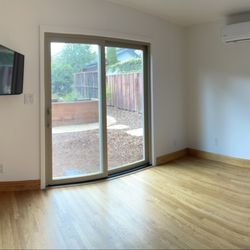 Omega Construction and Handyman Services - Finished interior note mini split installed and new light with slider and new window