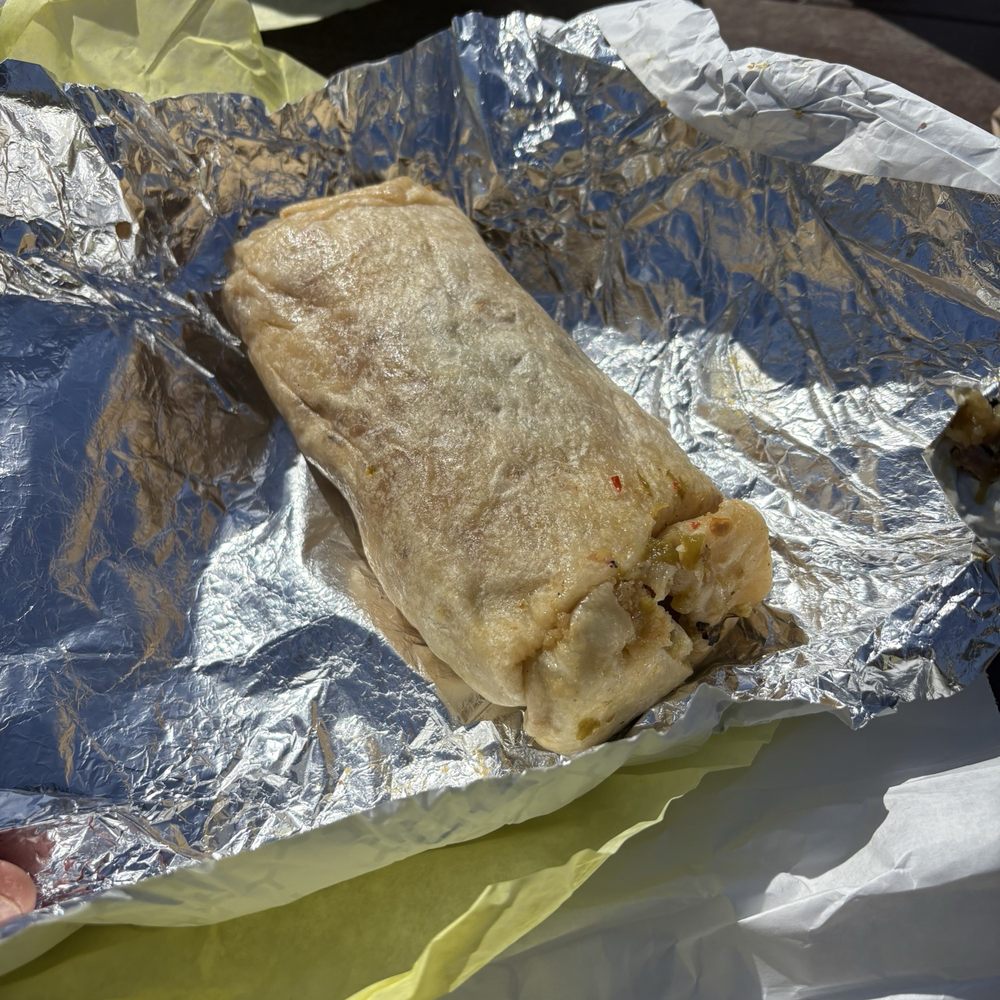 Green Chile Breakfast Burrito w/ sausage. Green Chile Breakfast Burrito w/ sausage.