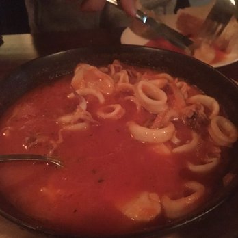 Market North End - Calamari, shrimp and scallops in tomato broth - Bars Near Me - Birmingham, Michigan Market North End - Calamari, shrimp and scallops in tomato broth - Bars Near Me - Birmingham, Michigan