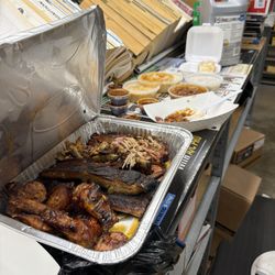 Pirate Pit BBQ - Sampler with brisket, wings, pulled pork, Mac and cheese, Cole slaw, potato salad, baked beans, and some corn bread