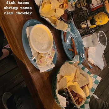 Mullet Bay Restaurant - a table full of tacos and chips - American Near Me - Saint Simons Island, Georgia Mullet Bay Restaurant - a table full of tacos and chips - American Near Me - Saint Simons Island, Georgia