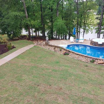 Ramirez Lawn & Landscaping - They installed several hundred feet of drainage line, Two 24" and one 12" catch basin to control runoff to the lake. - Landscaping Near Me Ramirez Lawn & Landscaping - They installed several hundred feet of drainage line, Two 24" and one 12" catch basin to control runoff to the lake. - Landscaping Near Me