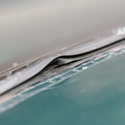 Richard's Auto Glass - nice channel around the windshield seal to let water into the cabin