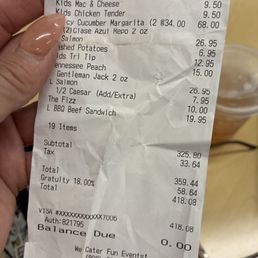 Charged a gratuity of 18.00% and not informed I was being charged.