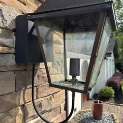 Gooseneck gas lantern on a stone column -- gas light installation by Gas Products Unlimited