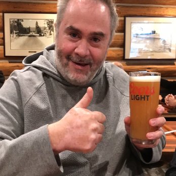 Austins Bar & Grill - My step dad enjoying the beer - American Near Me - Olathe, Kansas