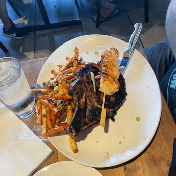 Yard House - Lo rean Ribeye with grilled shrimp skewer - New American Near Me - Bakersfield, California Yard House - Lo rean Ribeye with grilled shrimp skewer - New American Near Me - Bakersfield, California