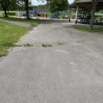 Frank Baker Park - The playground is nestled in right next to a bunch of covered picnic tables. - Tennis Near Me - Canandaigua, New York
