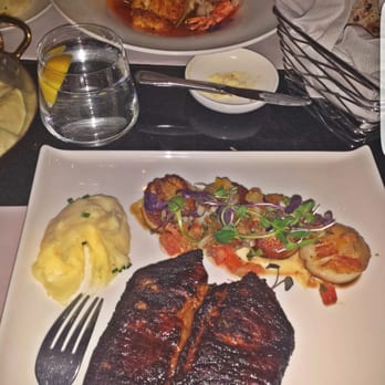 Harbour 60 - Med rare steak with scallops and mashed potatoes on the side Opposite meal: Fish, shrimp and mashed potatoes on the side - Steakhouses Near Me - Toronto, Ontario Harbour 60 - Med rare steak with scallops and mashed potatoes on the side Opposite meal: Fish, shrimp and mashed potatoes on the side - Steakhouses Near Me - Toronto, Ontario
