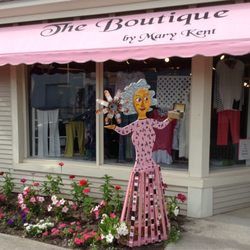 Boutique by Marykent - Our garden lady in pink welcomes customers to the store.