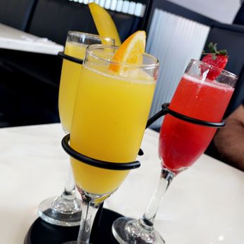 Mimosa Cafe - The flight mimosa..mango..strawberry and classic - Breakfast & Brunch Near Me - Bakersfield, California