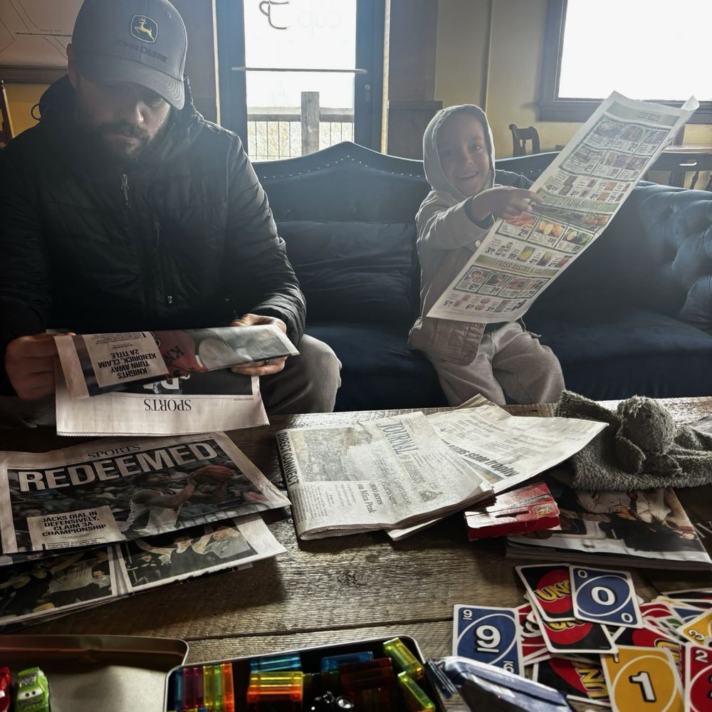 The Tin Cup - My son and I taking in the news - Salad Near Me - Harrison, Idaho The Tin Cup - My son and I taking in the news - Salad Near Me - Harrison, Idaho