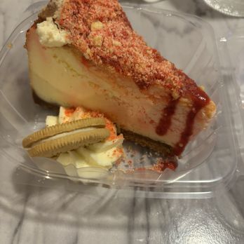 Cheesecake Creations - Strawberry Crunch....one of their most popular flavors (think strawberry crunch icecream bar coating + cheesecake!) - Desserts Near Me - Burlington, North Carolina