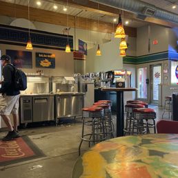 Indoor seating area, Chip & salsa bar.