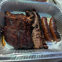 Brisket, bbq ribs, jalapeño cheese sausage Brisket, bbq ribs, jalapeño cheese sausage