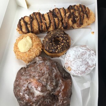 Donut King - Apple Fritter, Coconut Cream, Heath Bar, Powdered Bavarian Cream and Samoa Log - Donuts Near Me - Winter Park, Florida Donut King - Apple Fritter, Coconut Cream, Heath Bar, Powdered Bavarian Cream and Samoa Log - Donuts Near Me - Winter Park, Florida